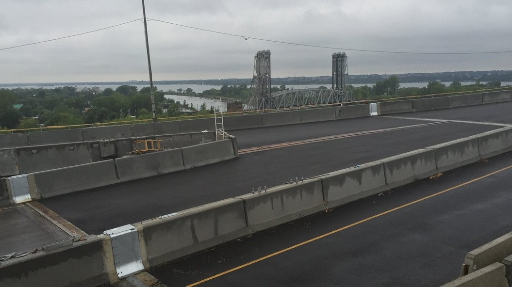 entrepreneur,mohawk,intimidation,pont,Mercier,poursuite,palais,Longueuil,justice,menaces,accès,coup,feu,immeubles,employés,mort,appel,offres,parties,société