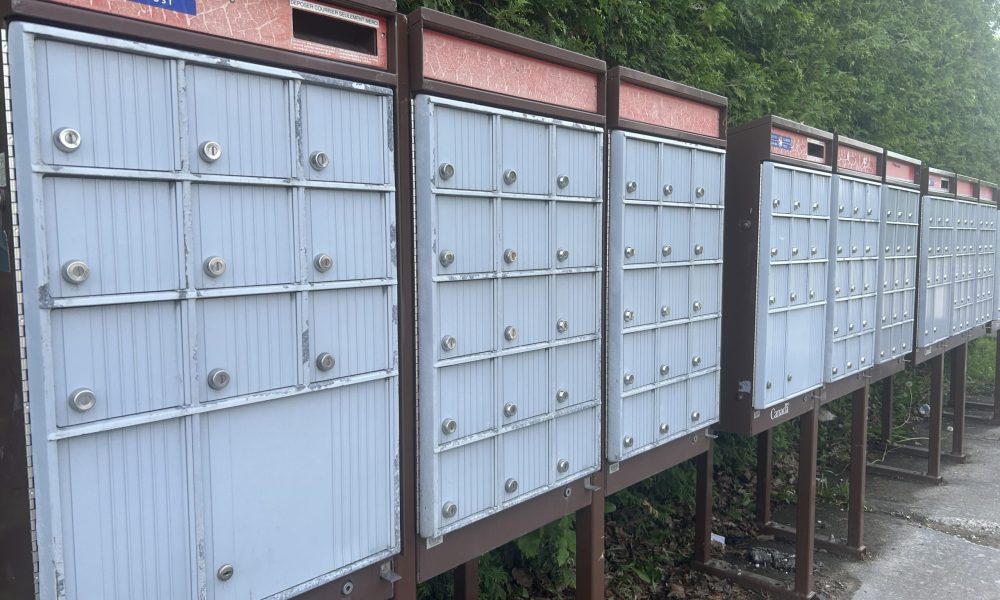 Postes,Canada,Longueuil,boîtes,postales,livraison,domicile,annonce,programme,décision,conversion,province,nouvelle,clé,service,portes